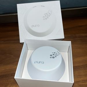 Pura 3 Smart Fragrance Diffuser - with opened fragrance refills